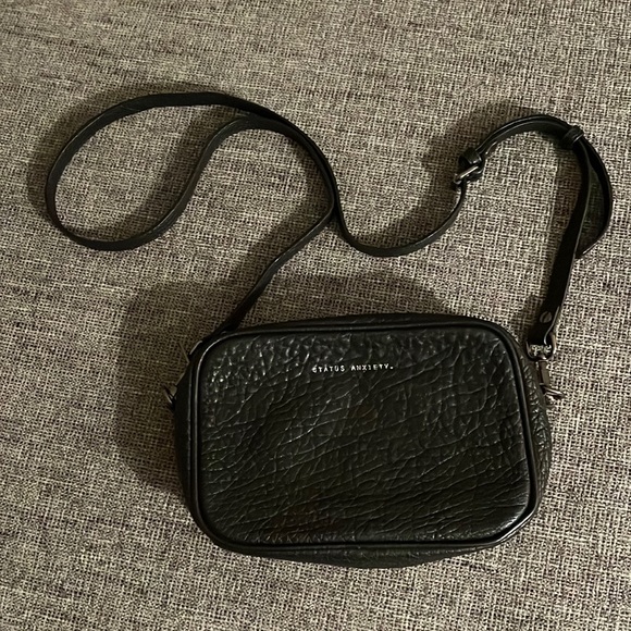 Status Anxiety Bags Status Anxiety Plunder Crossbody In Black